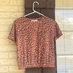 WallFlower size small top. Mid length with chest pocket and elastic band.